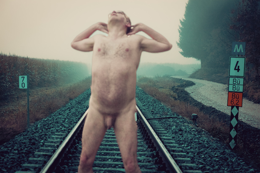 Nude close-up on railway line