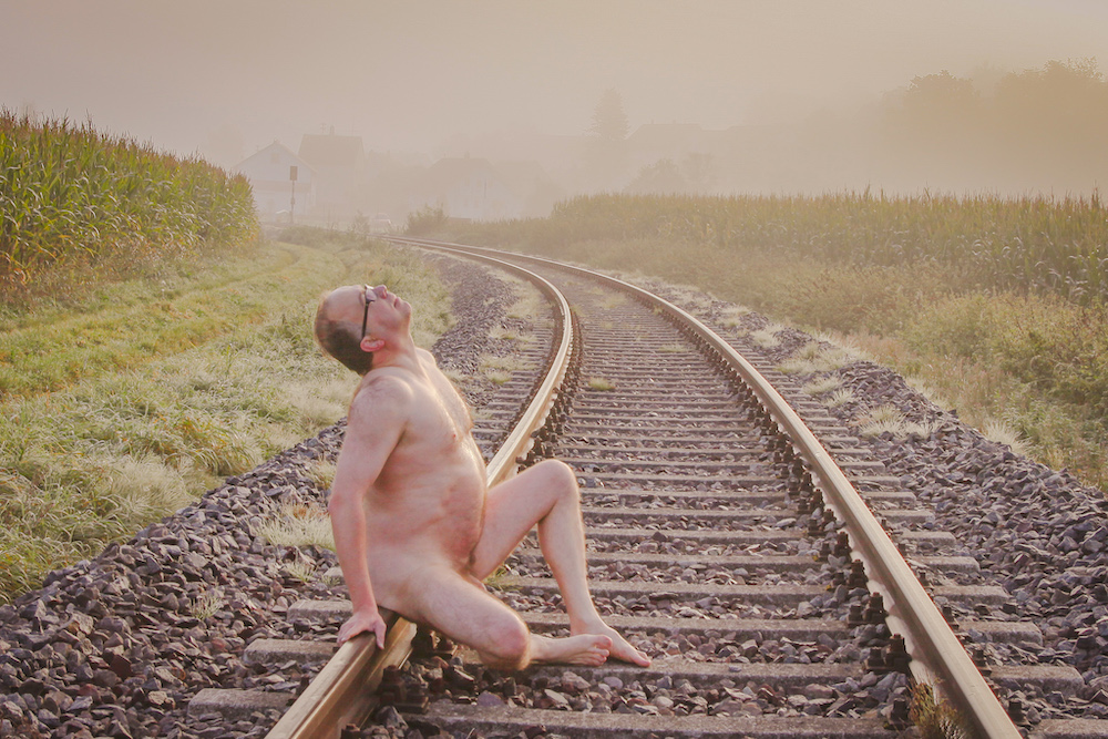 Nude on the railway line