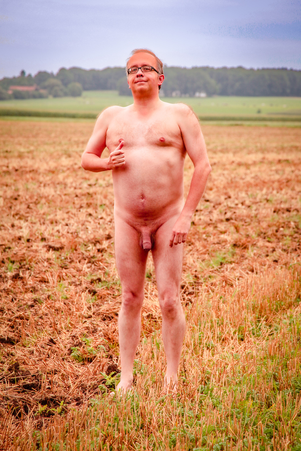Nude photo of a man in the fields