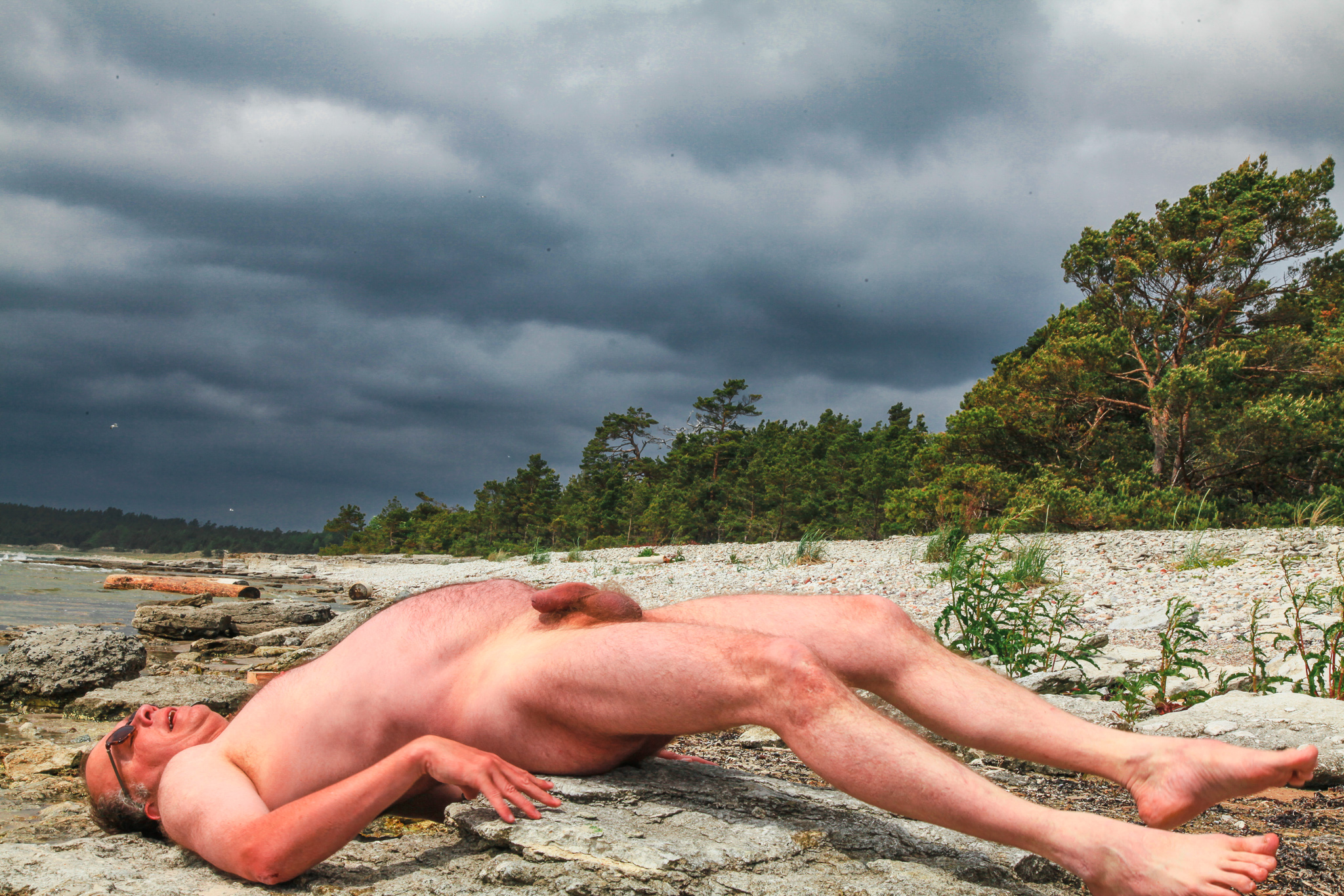 Nude man with his genitals exposed on a Gotland beach